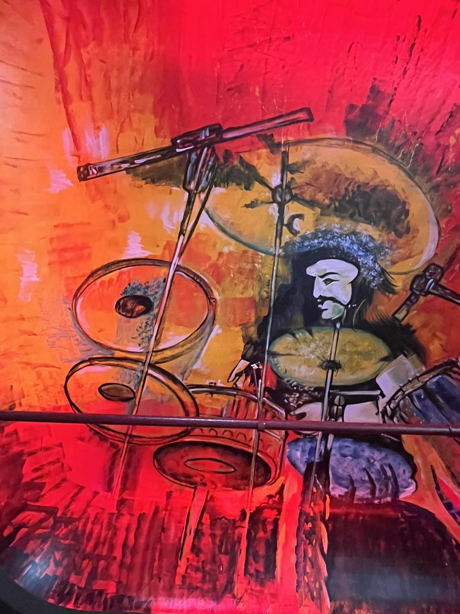 Hand-painted drummer mural at Tatsav Cafe Greater Noida