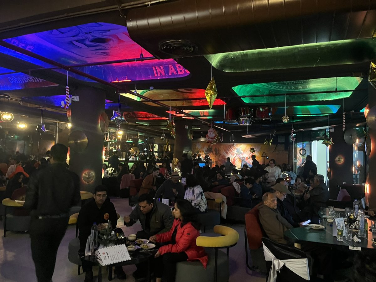 Tatsav Cafe full house — families dining at Purvanchal Royal City, Greater Noida